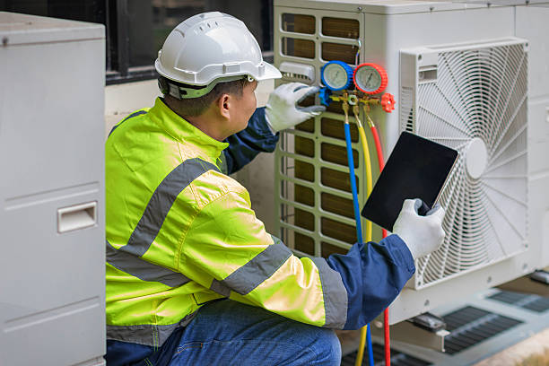 Professional Hvac technician working in North Marshfield, MA